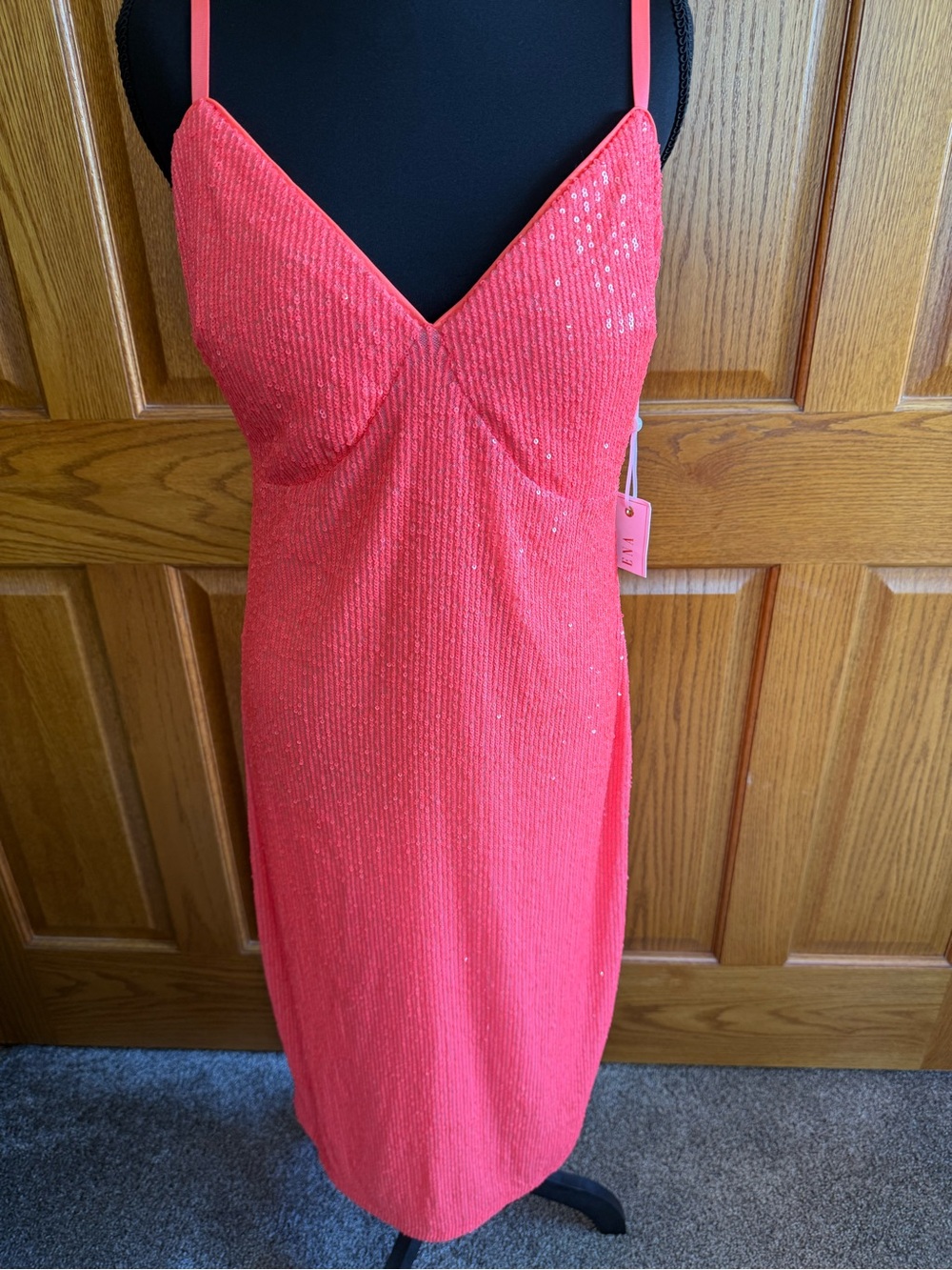 Bright and beautiful sequin dress by Siena. Available in a size 12.